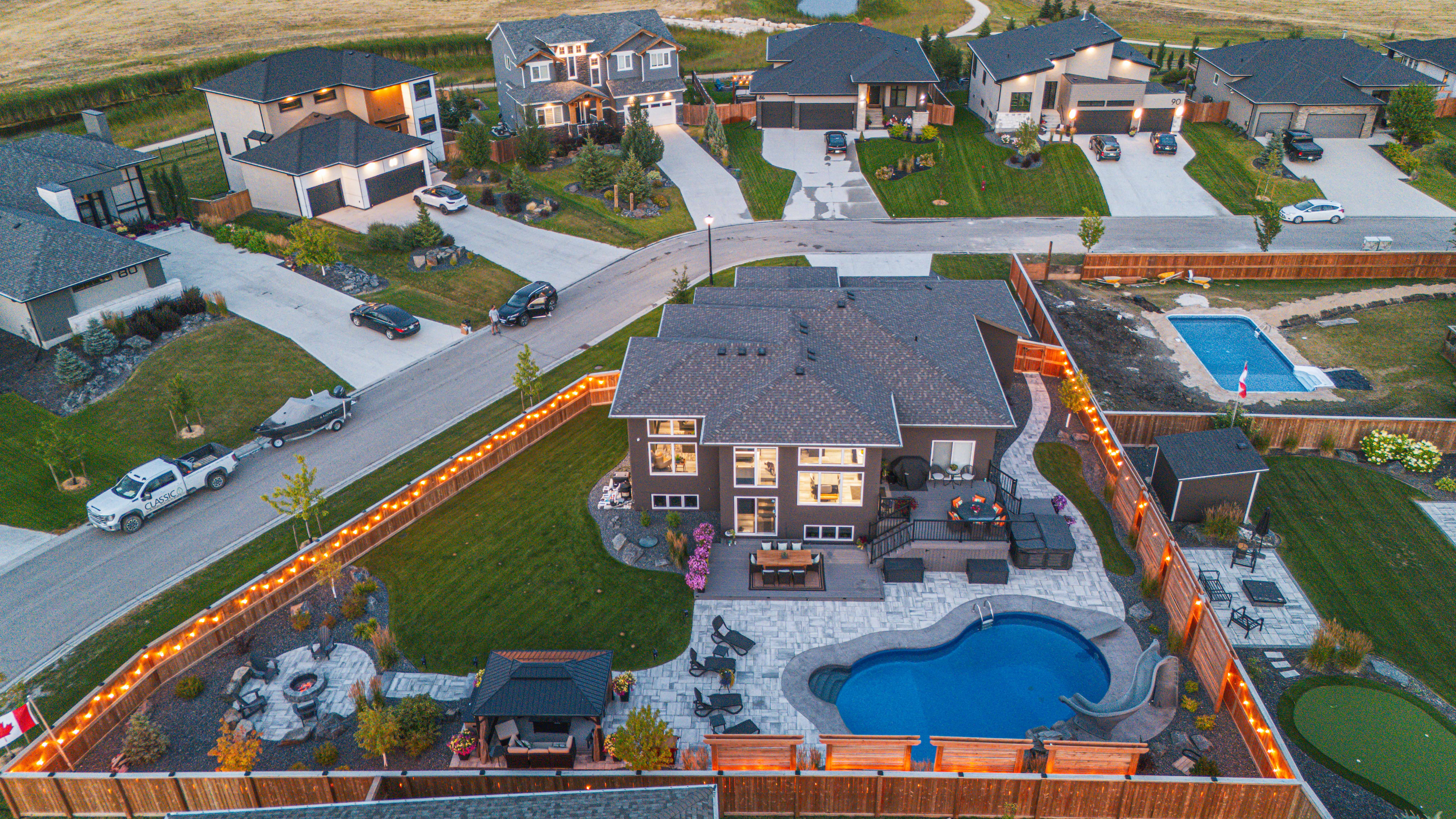 Custom paver patio and outdoor living features on a Southeast Michigan property