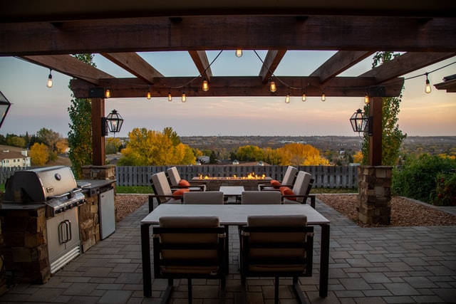 Outdoor kitchen and paver patio setup for summer entertaining in Southeast Michigan